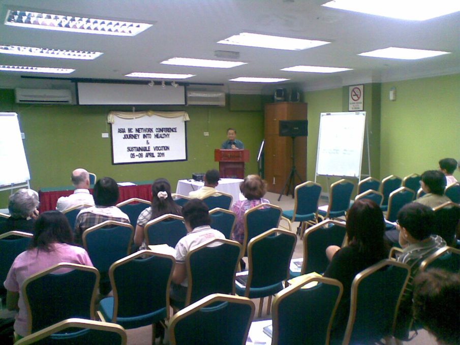 A speaker addressing the 2011 AMCN conference